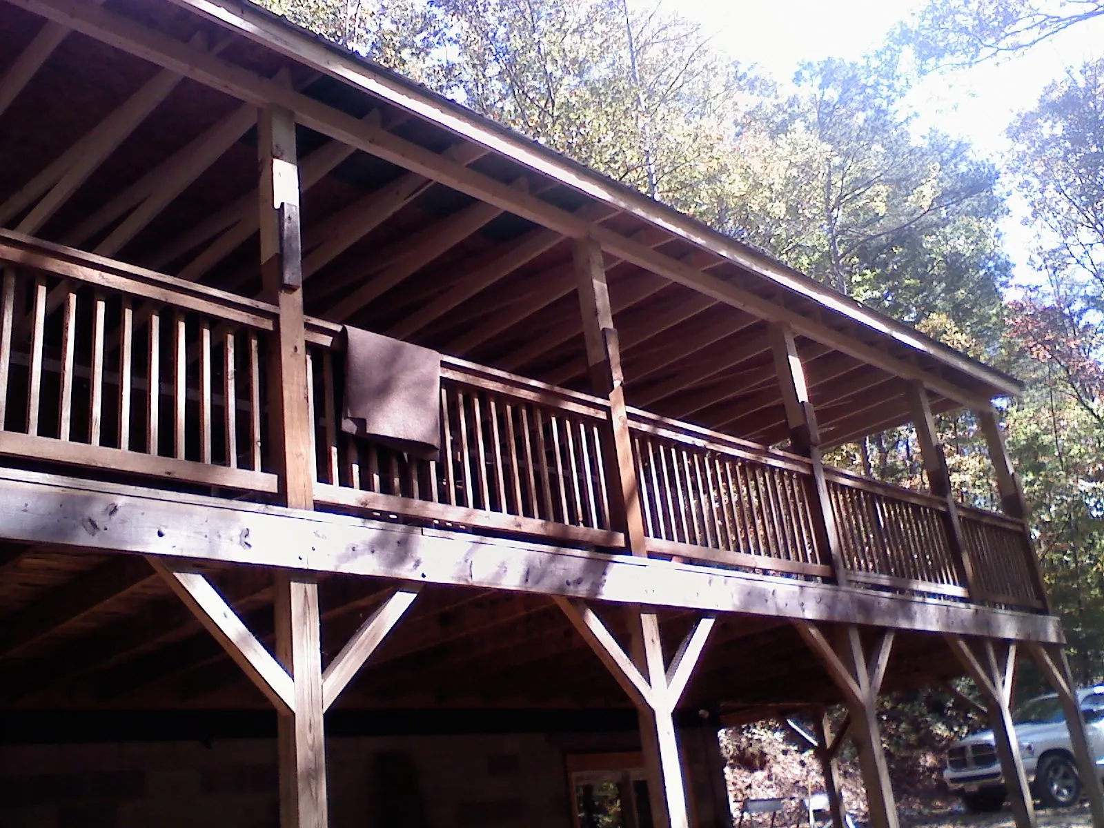 Timber framing under a new elevated porch and deck — Roof Leak Repair in Putnam Station by Roofing Brothers